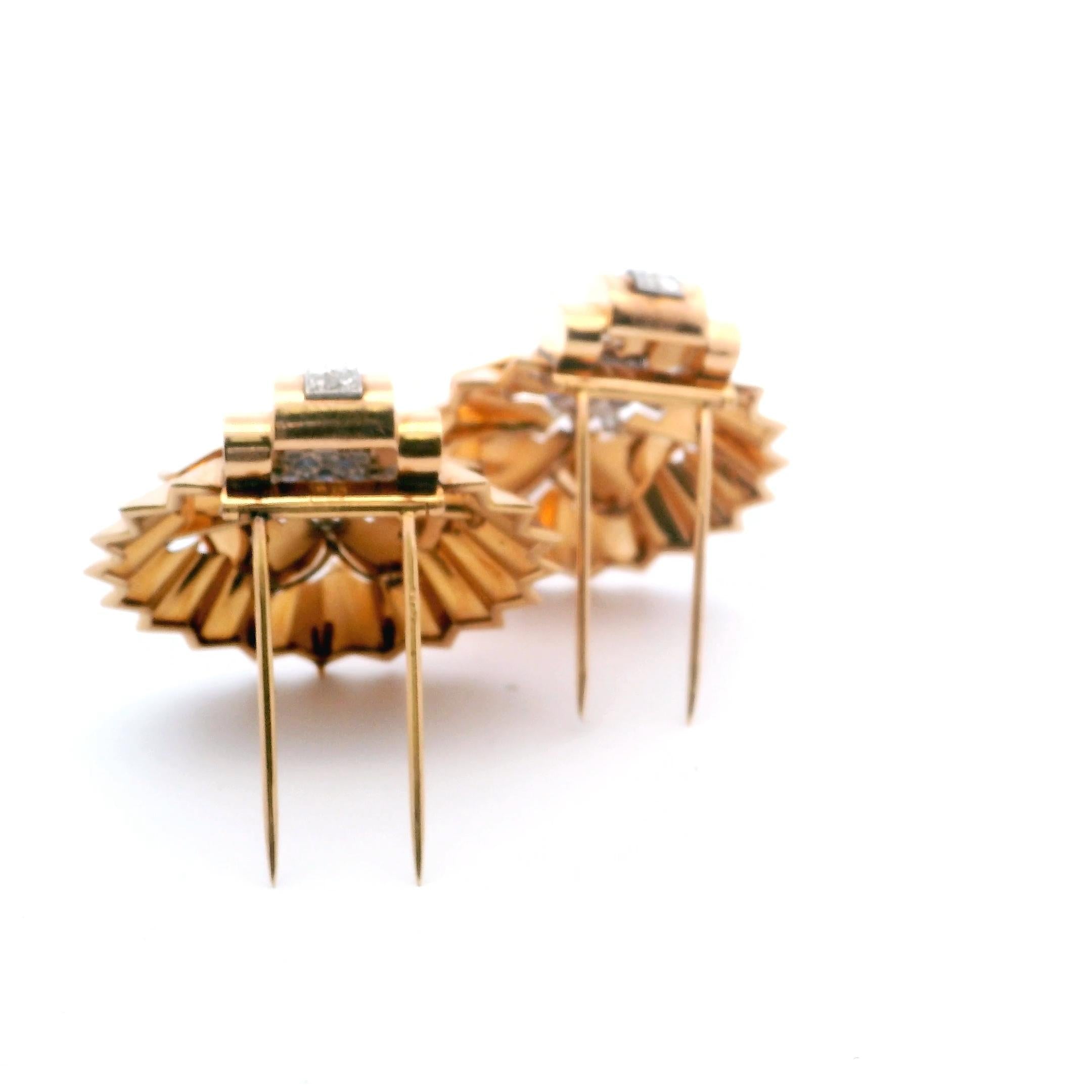 A pair of rose gold diamond and sapphire Retro brooches