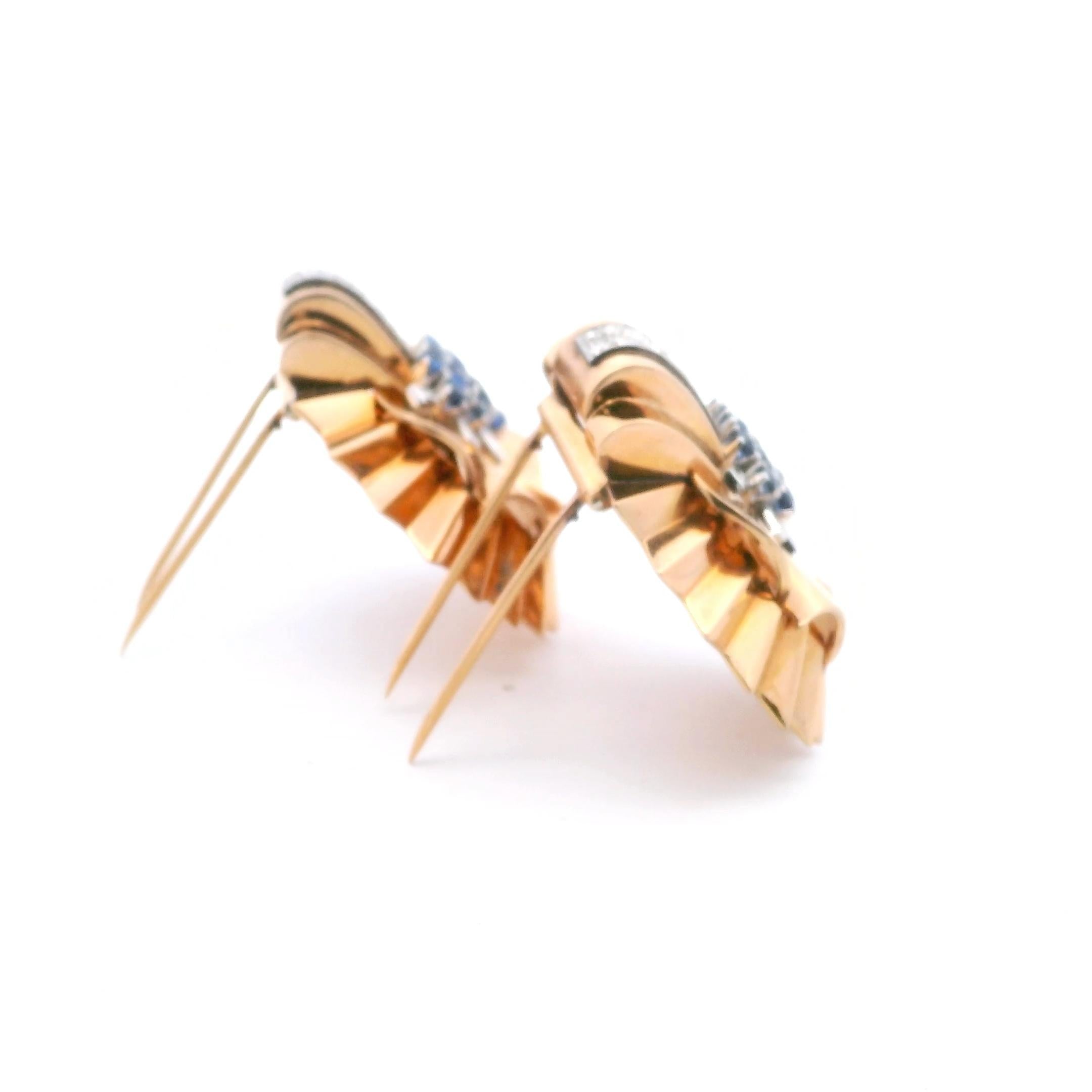 A pair of rose gold diamond and sapphire Retro brooches