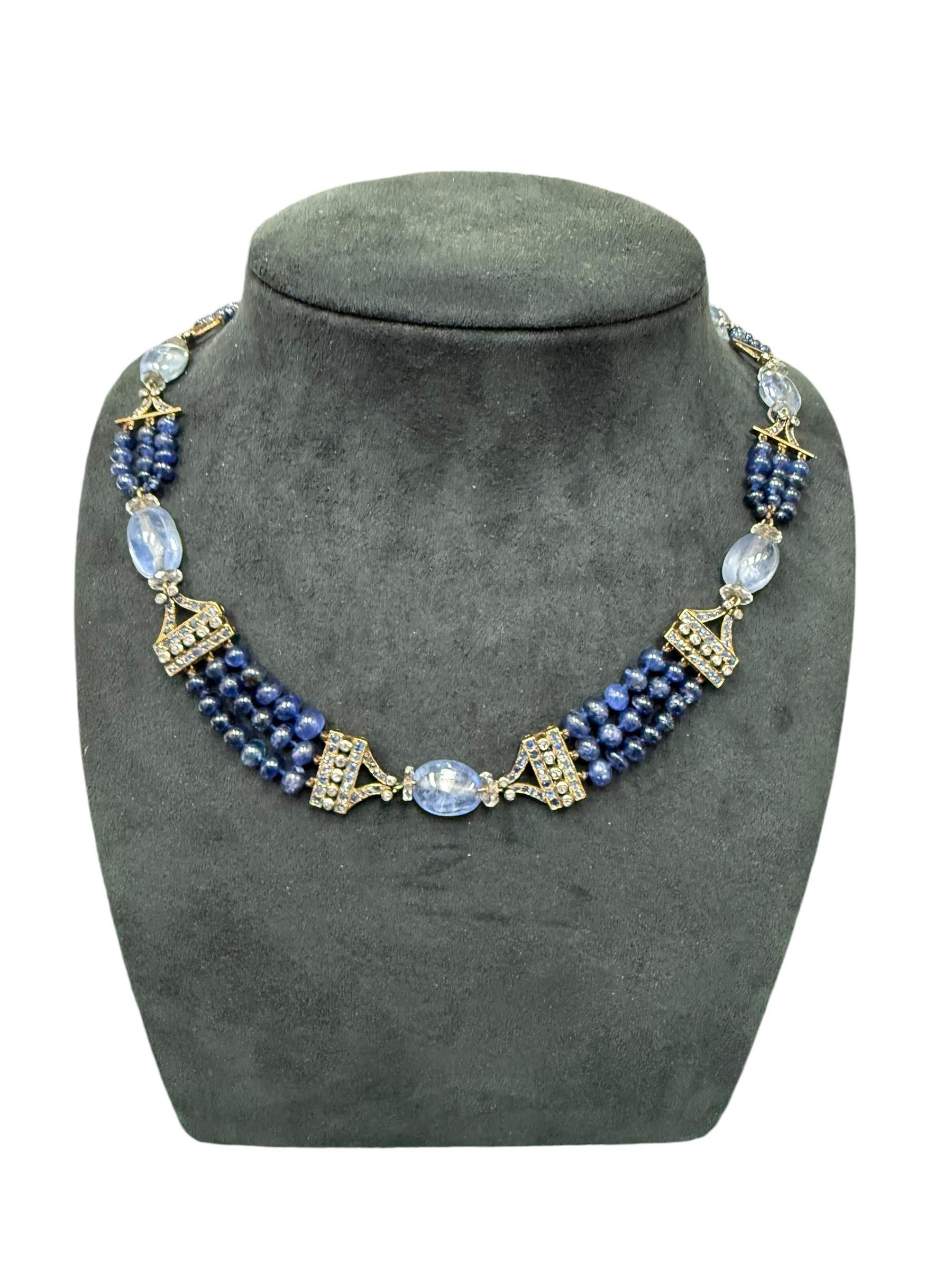 A sapphire and diamond bead necklace.