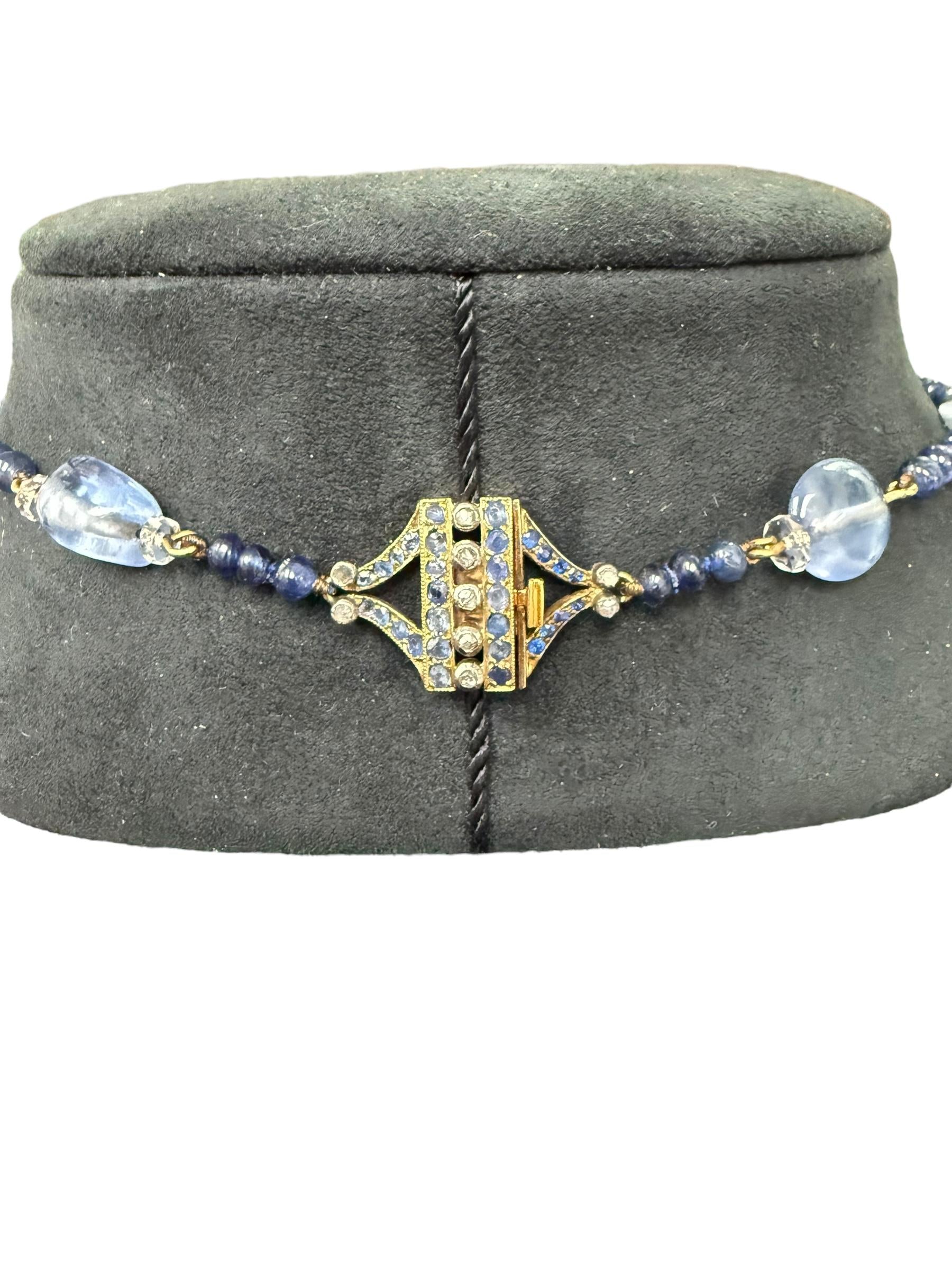 A sapphire and diamond bead necklace.