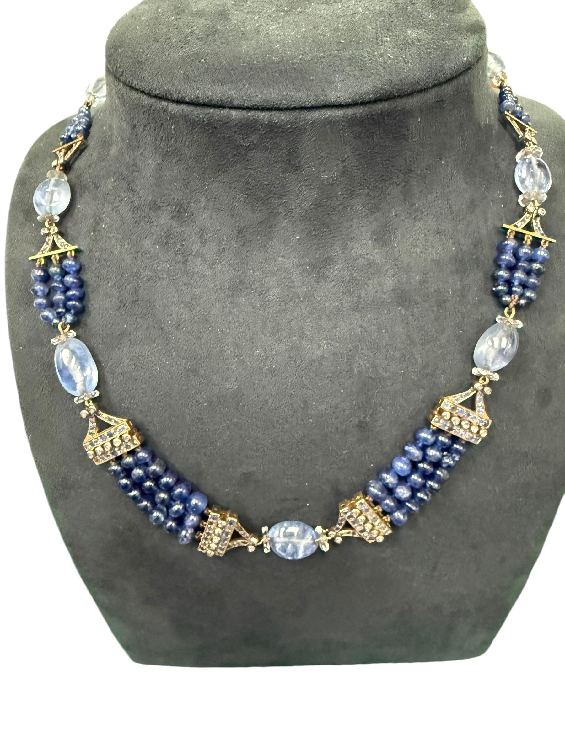 A sapphire and diamond bead necklace.