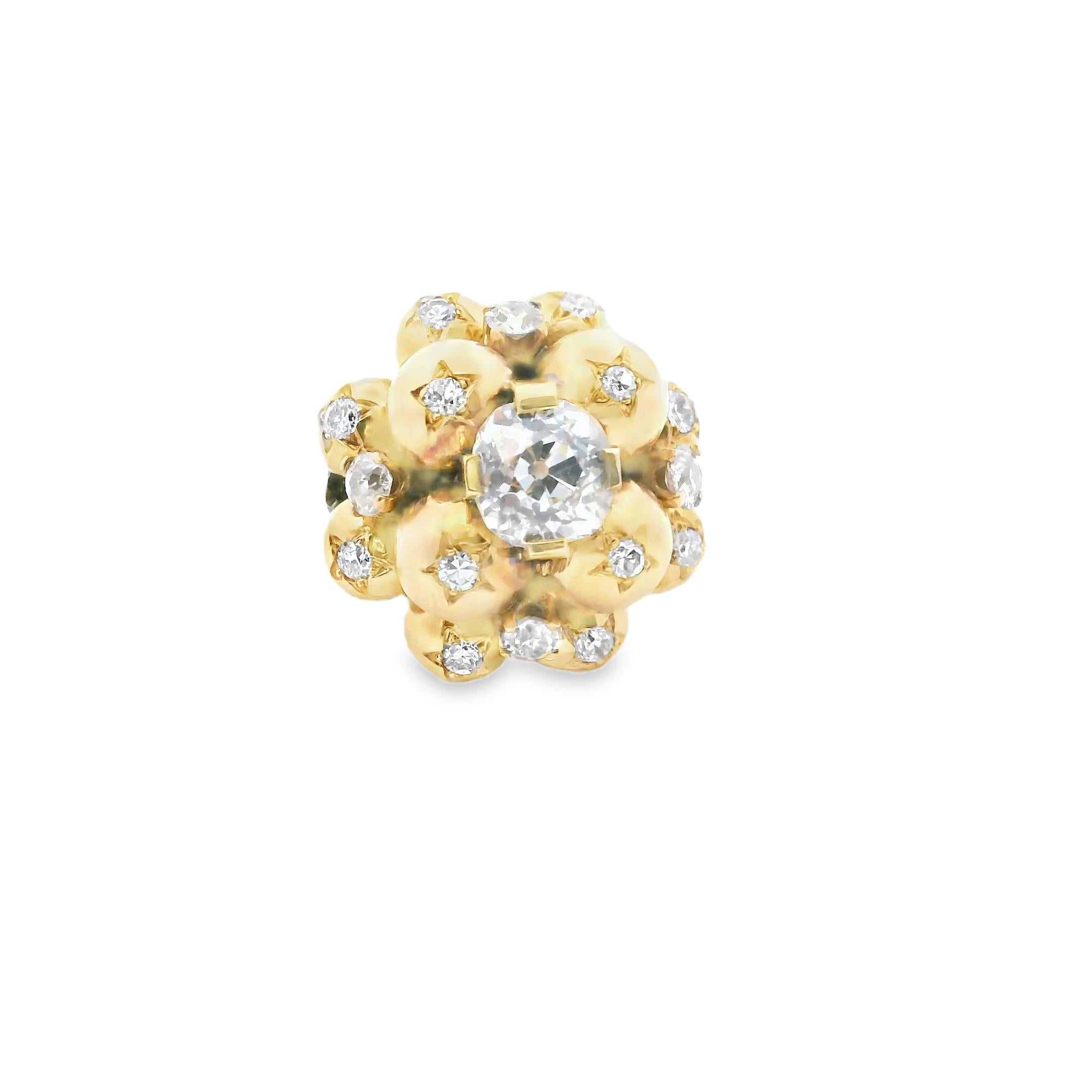 A 18K Yellow Gold ring composed of 12 balls star-set with old-cut diamonds