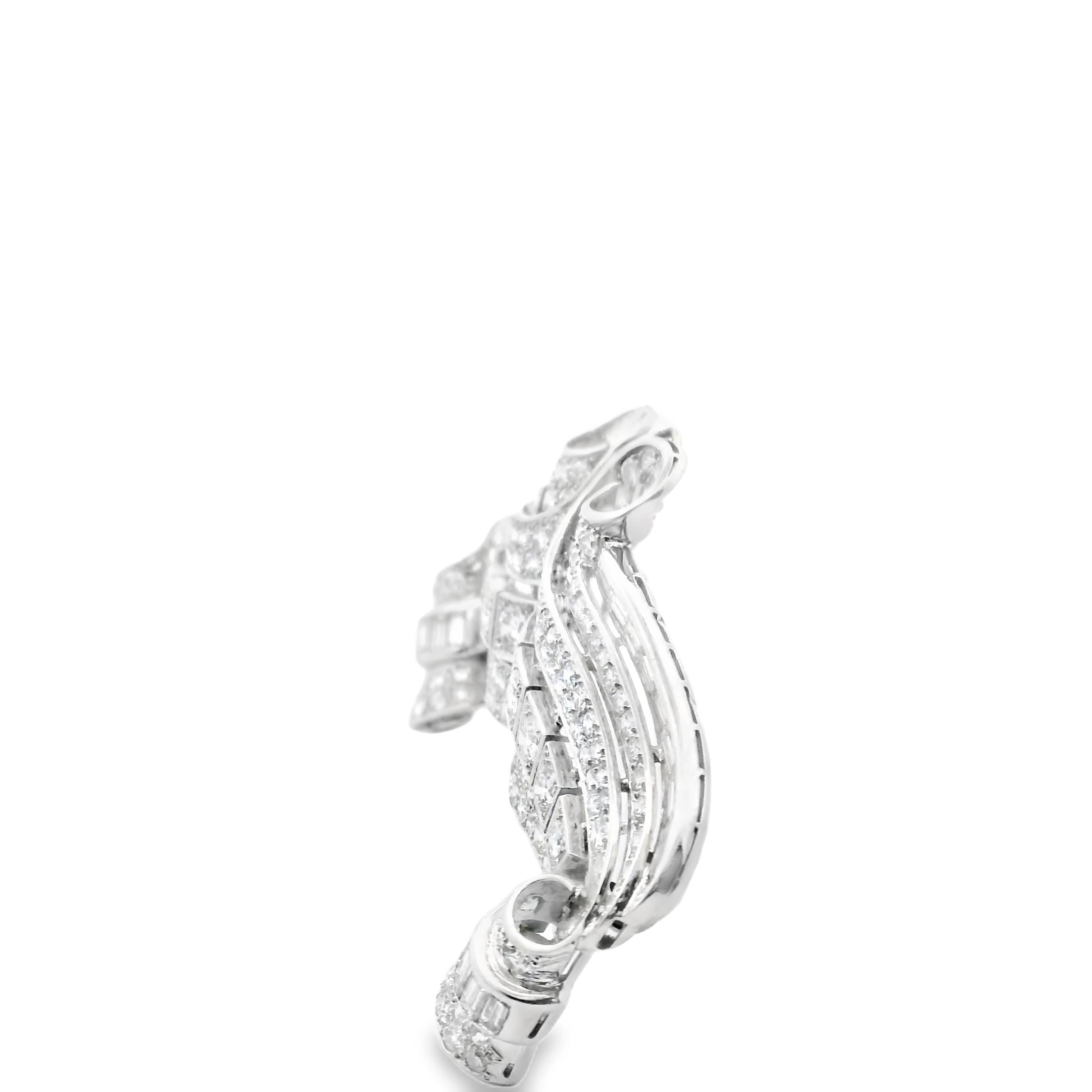 An Art Deco brooch in platinum and diamond.