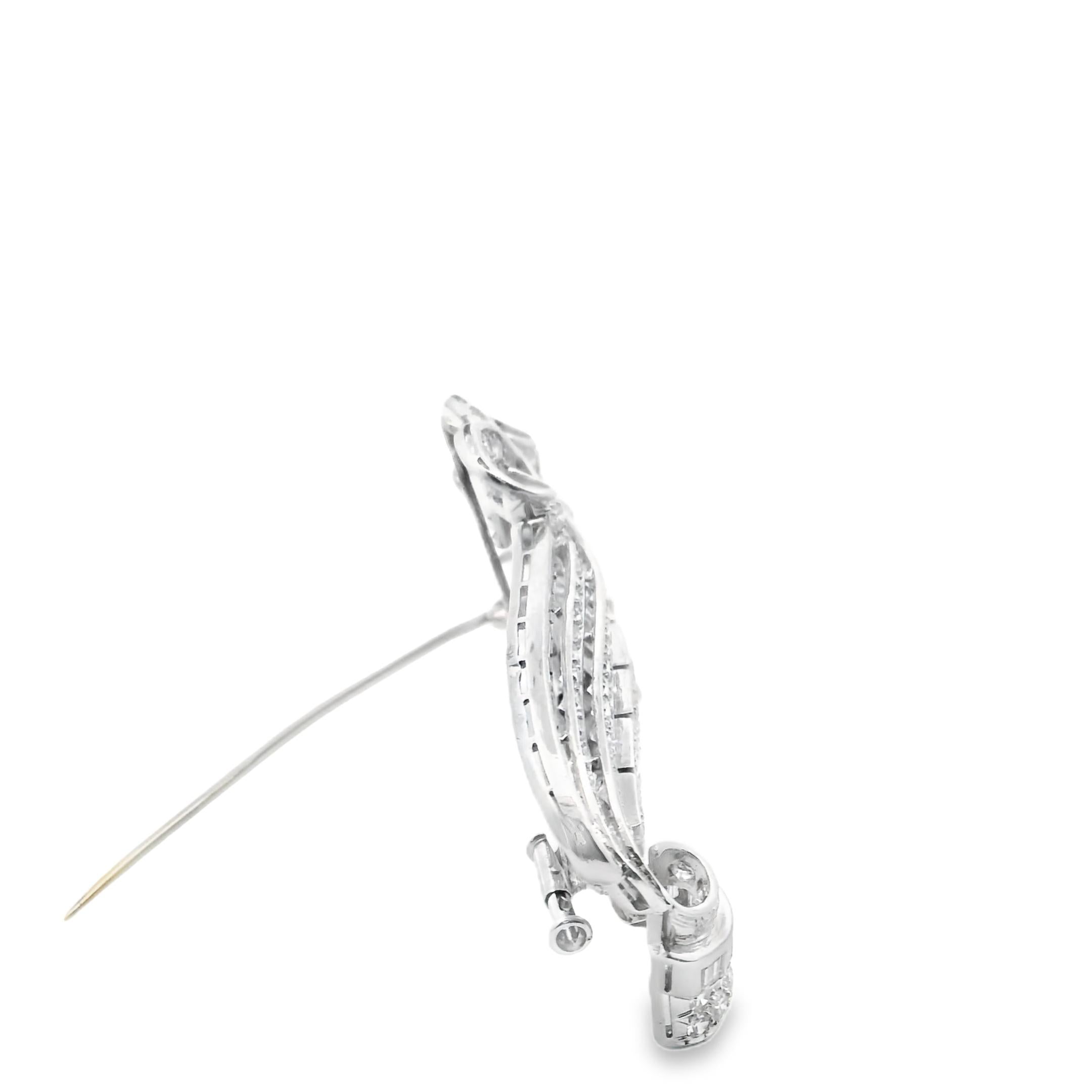 An Art Deco brooch in platinum and diamond.