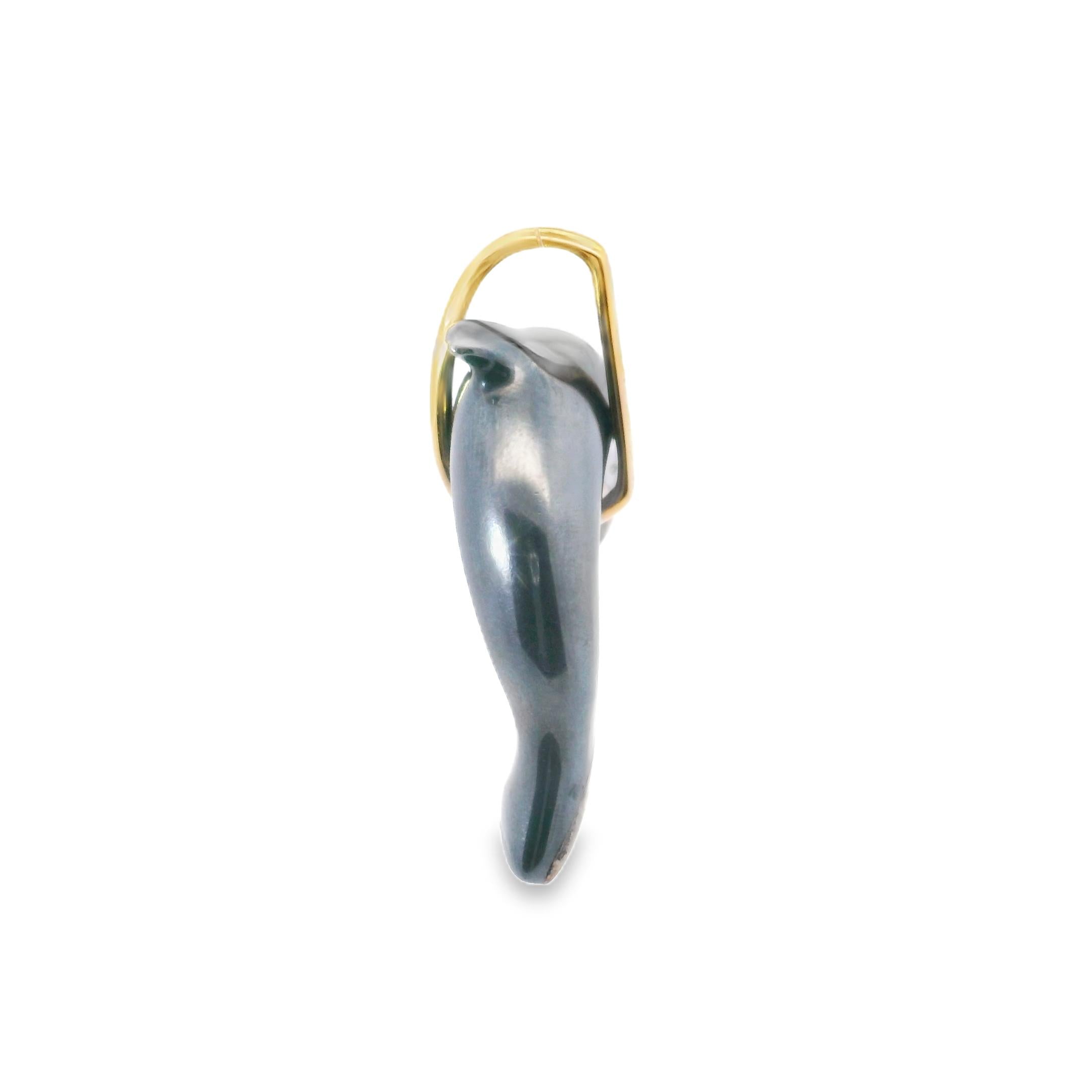 18k Yellow Gold and Hematite Dolphin Pendant By Cartier