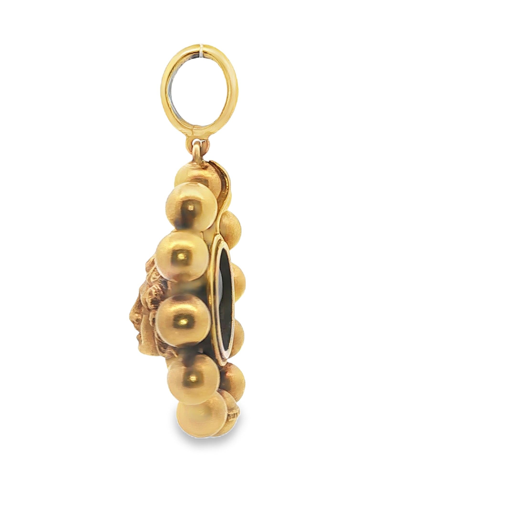 A Medusa Pendant by Ernesto Pierret in 14K Yellow Gold and Silver
