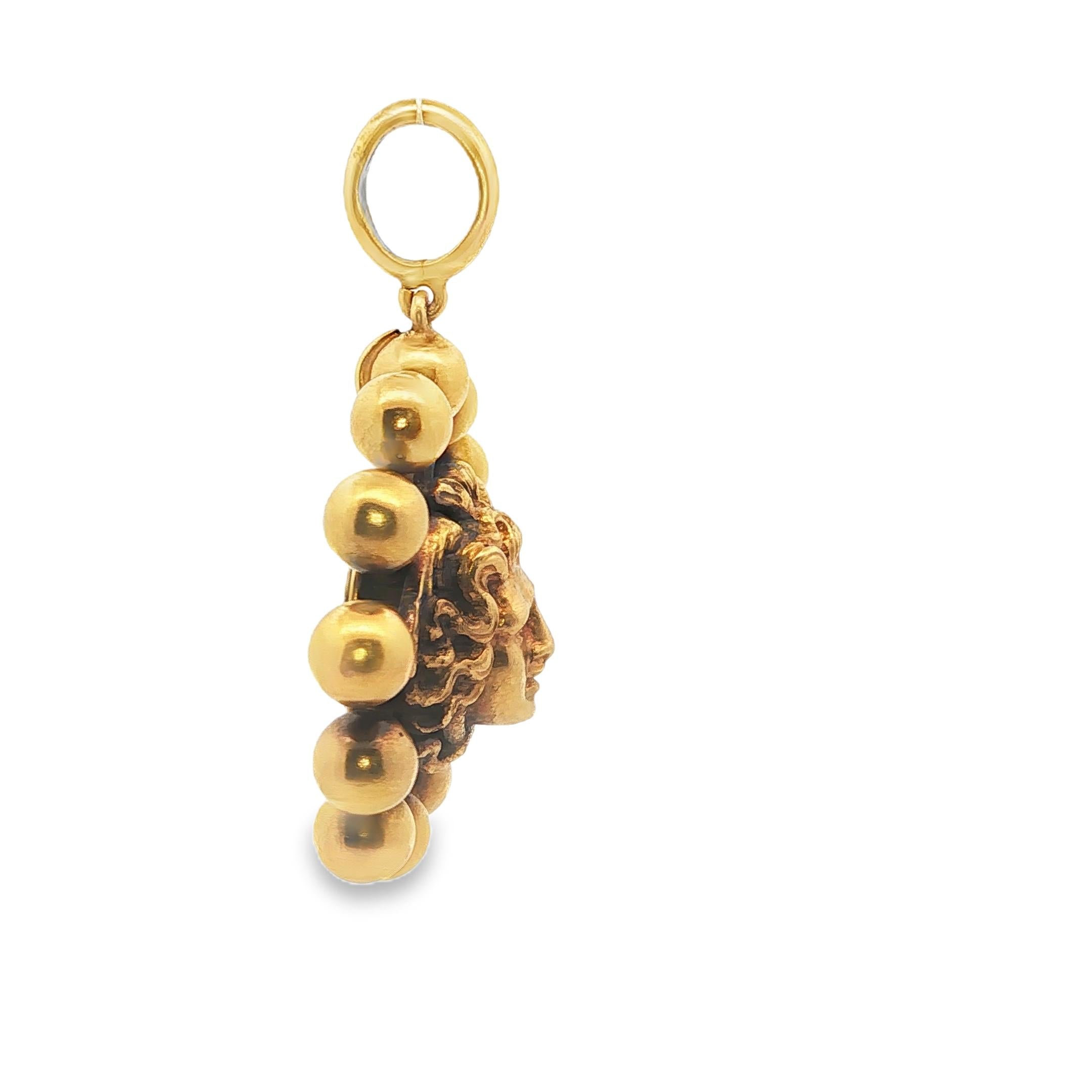A Medusa Pendant by Ernesto Pierret in 14K Yellow Gold and Silver