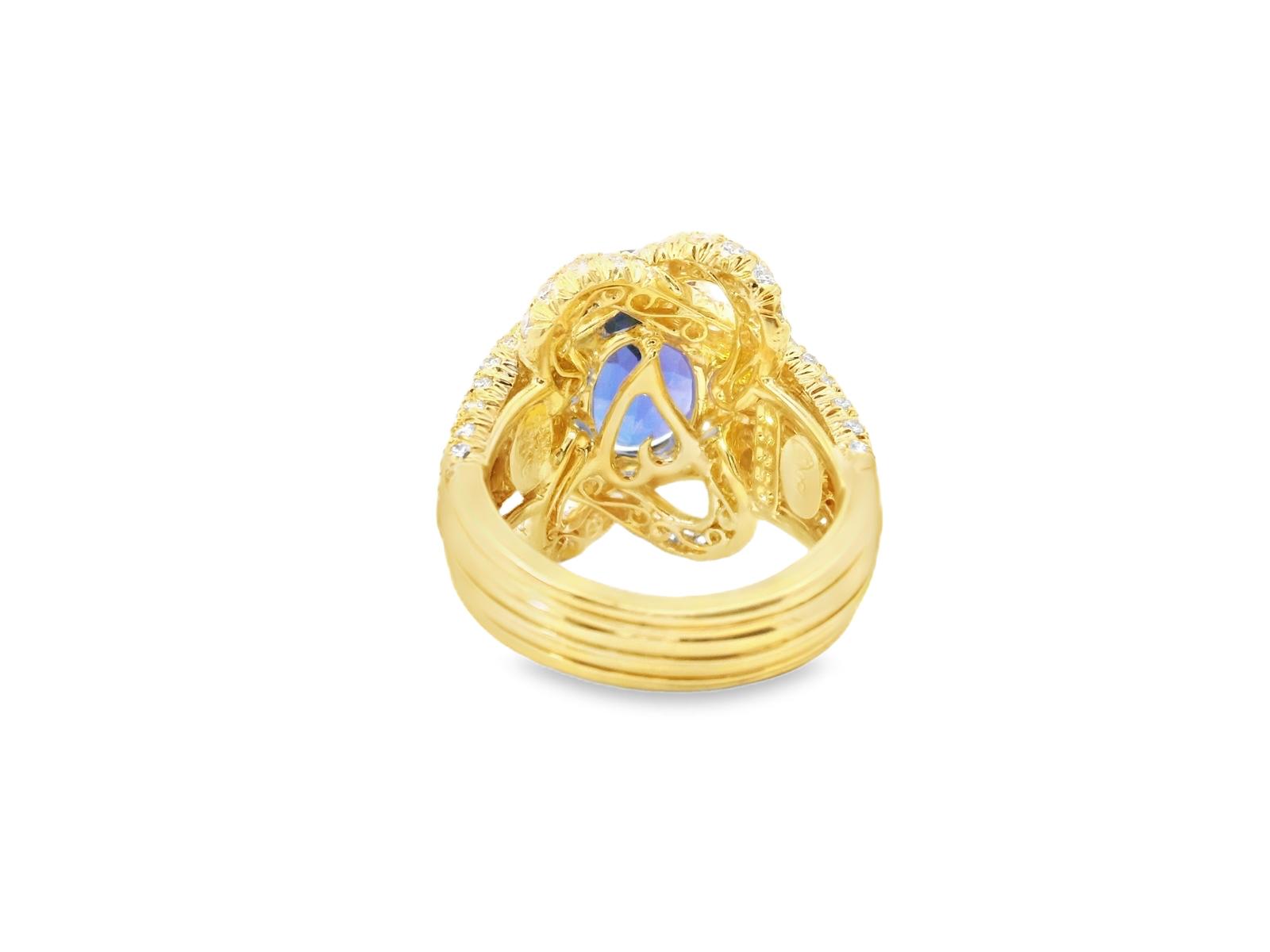 1980 Henry Dunay Tanzanite and Diamond Ring