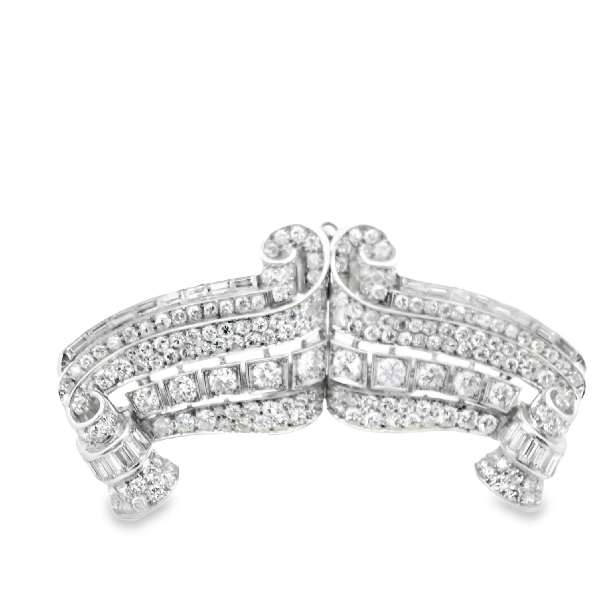 An Art Deco  brooch in platinum and diamond.