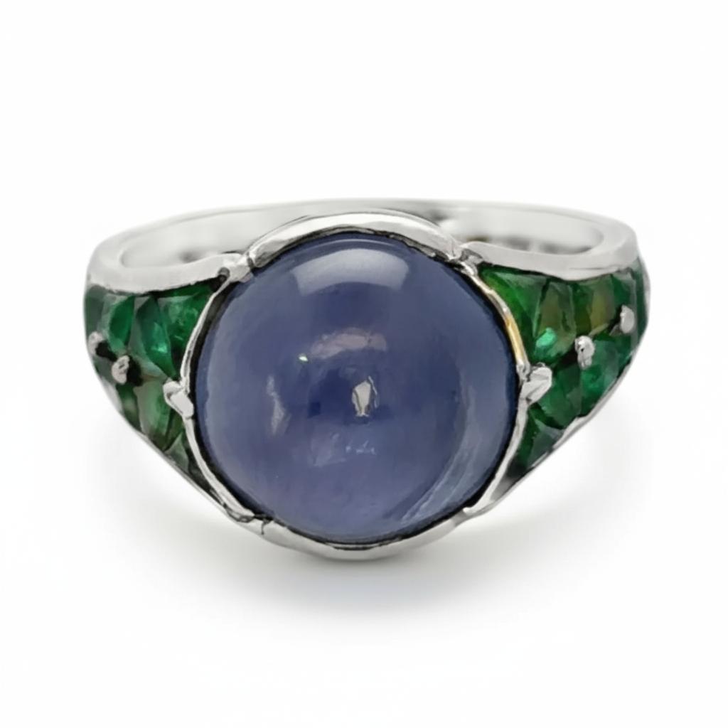 Sugarloaf Sapphire, Emerald, and Diamond Ring   Platinum · France · Circa 1925
